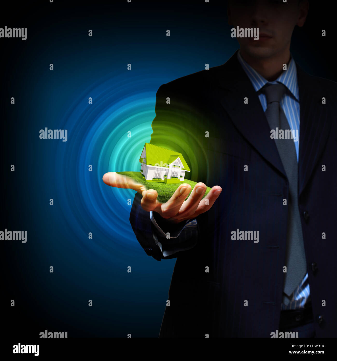 Residential building and a businessman holding it in his hands Stock ...