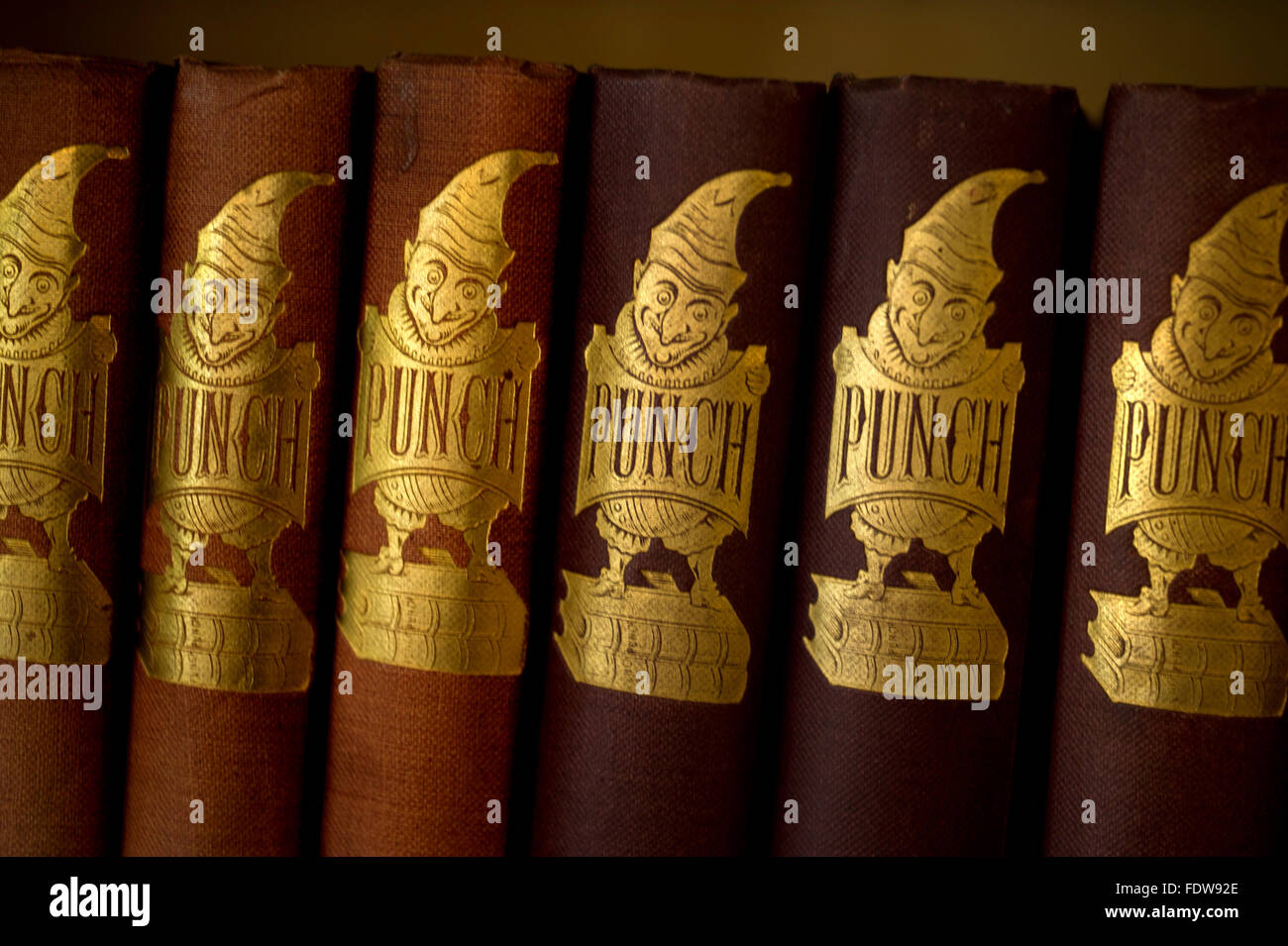 Spines of antique volumes of Punch magazine Stock Photo