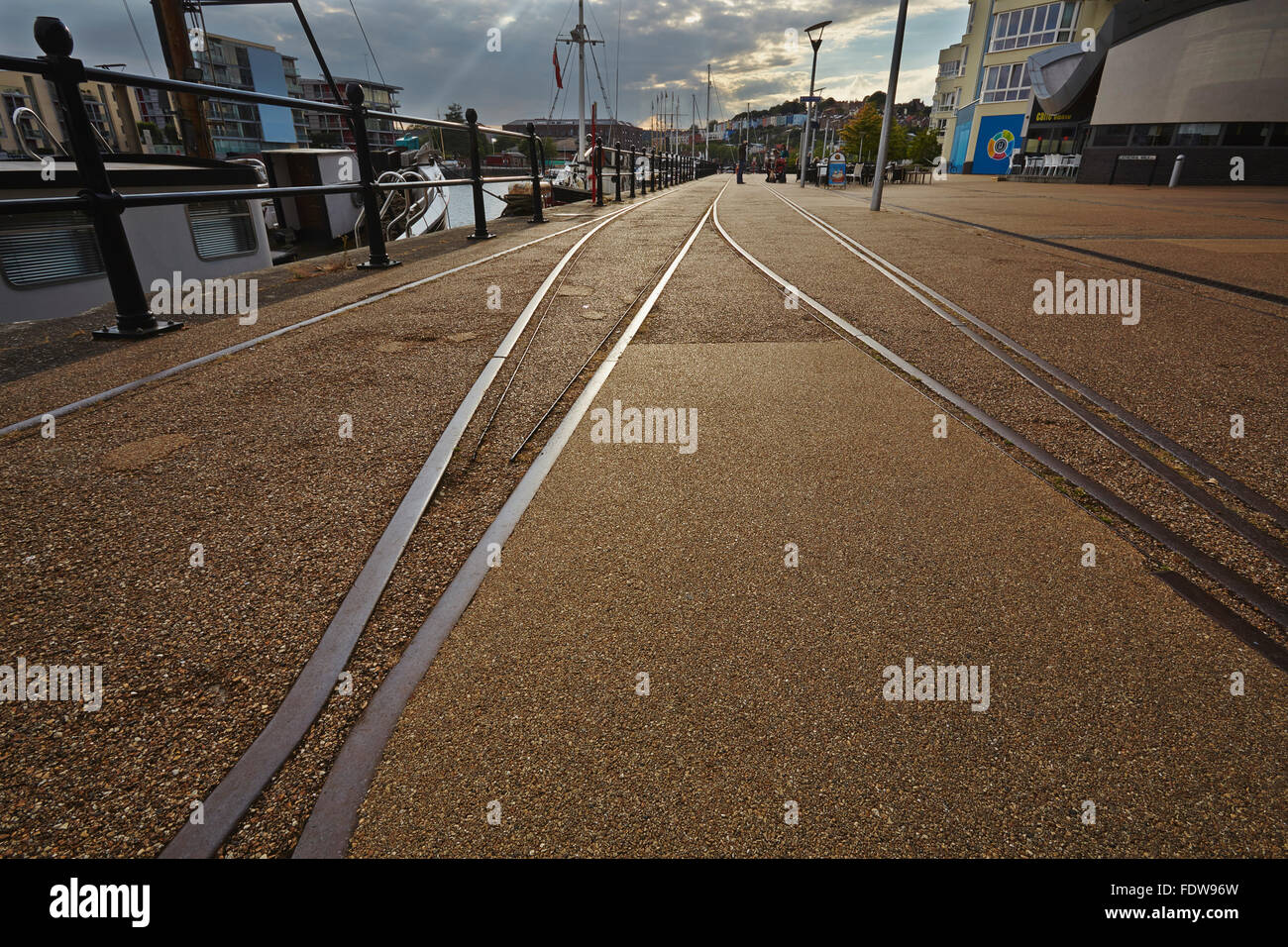 Railway tracks on a wharf in the old Bristol Docks, Bristol, England, Great Britain. Stock Photo