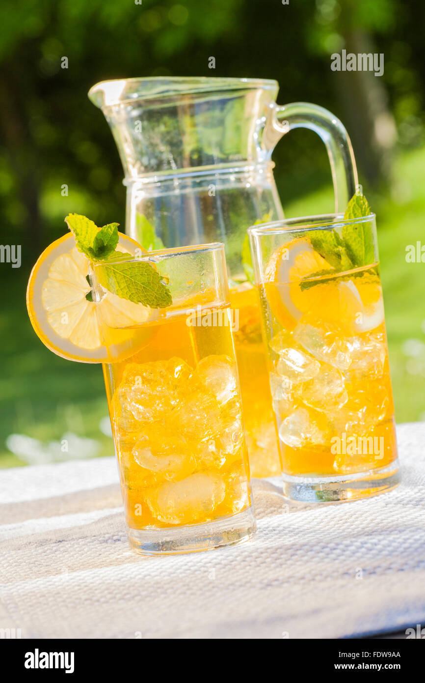 home made summer drink lemon ice tea in garden Stock Photo - Alamy