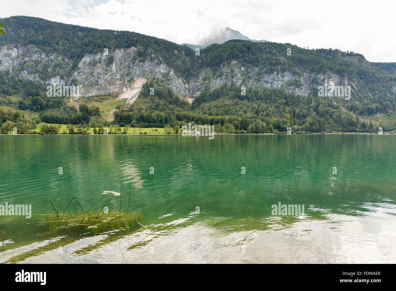 Idyllic Alpine lake Mondsee landscape, Austria. Focus on foreground. Stock Photo