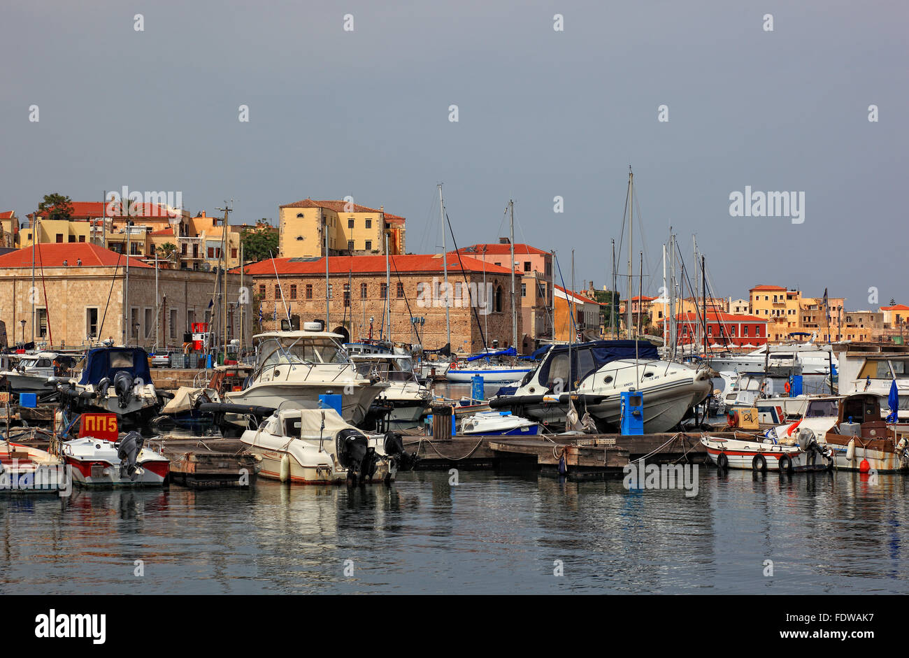 Crete, port Chania, Old Town and boats in the Venetian harbour Stock Photo