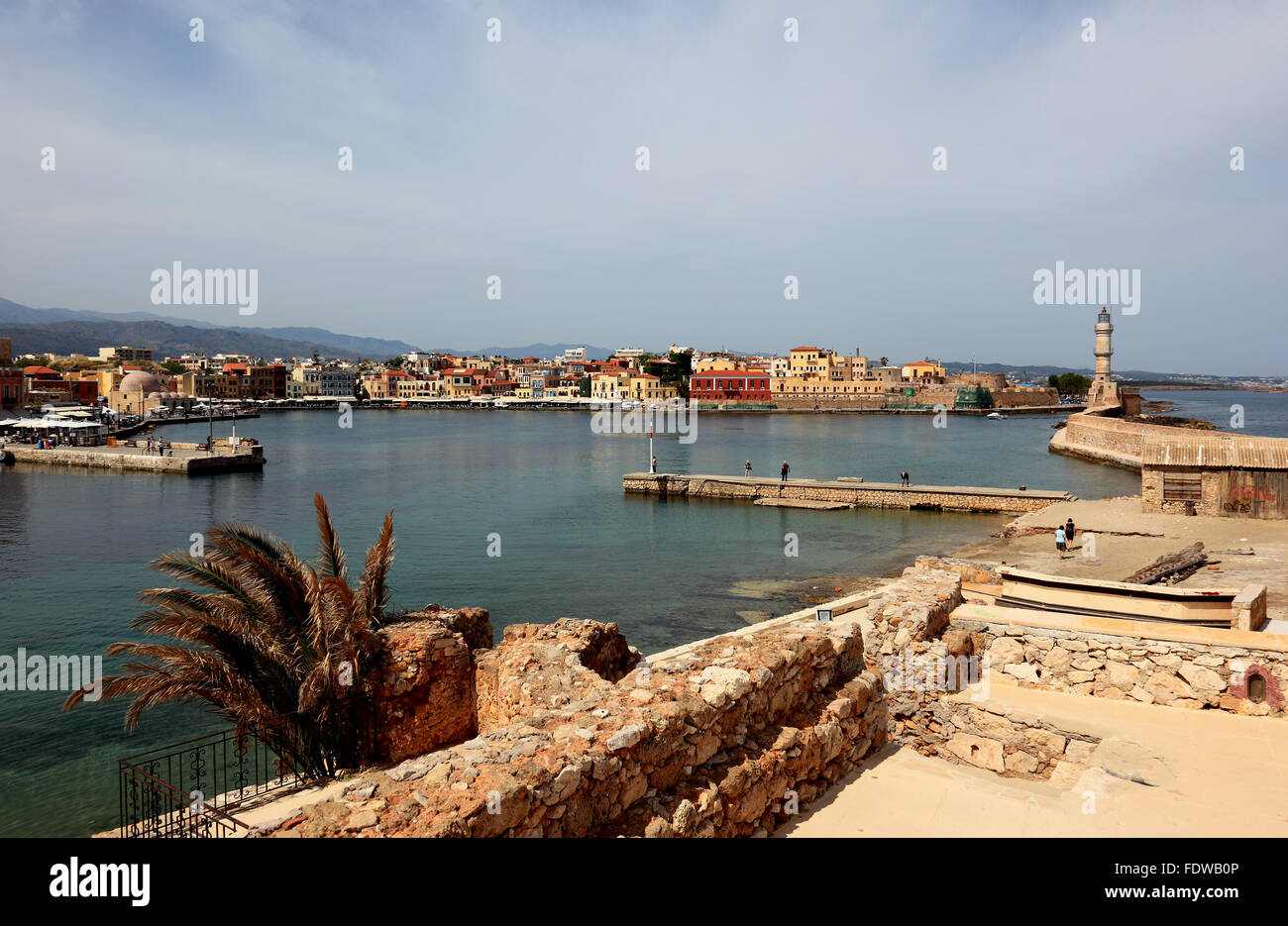 Crete, port Chania, look at the Venetian lighthouse and the Old Town Stock Photo