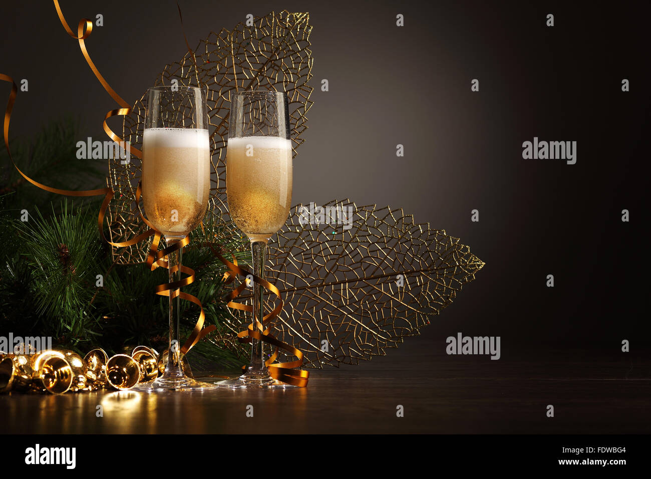 Two champagne glasses ready to bring in the New Year Stock Photo - Alamy