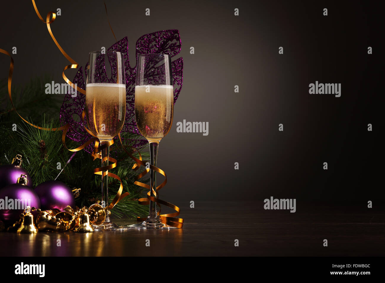 Two champagne glasses ready to bring in the New Year Stock Photo - Alamy