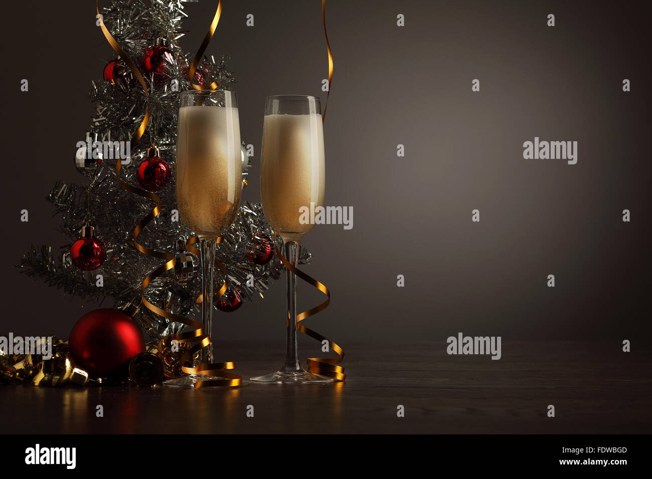 Two champagne glasses ready to bring in the New Year Stock Photo - Alamy