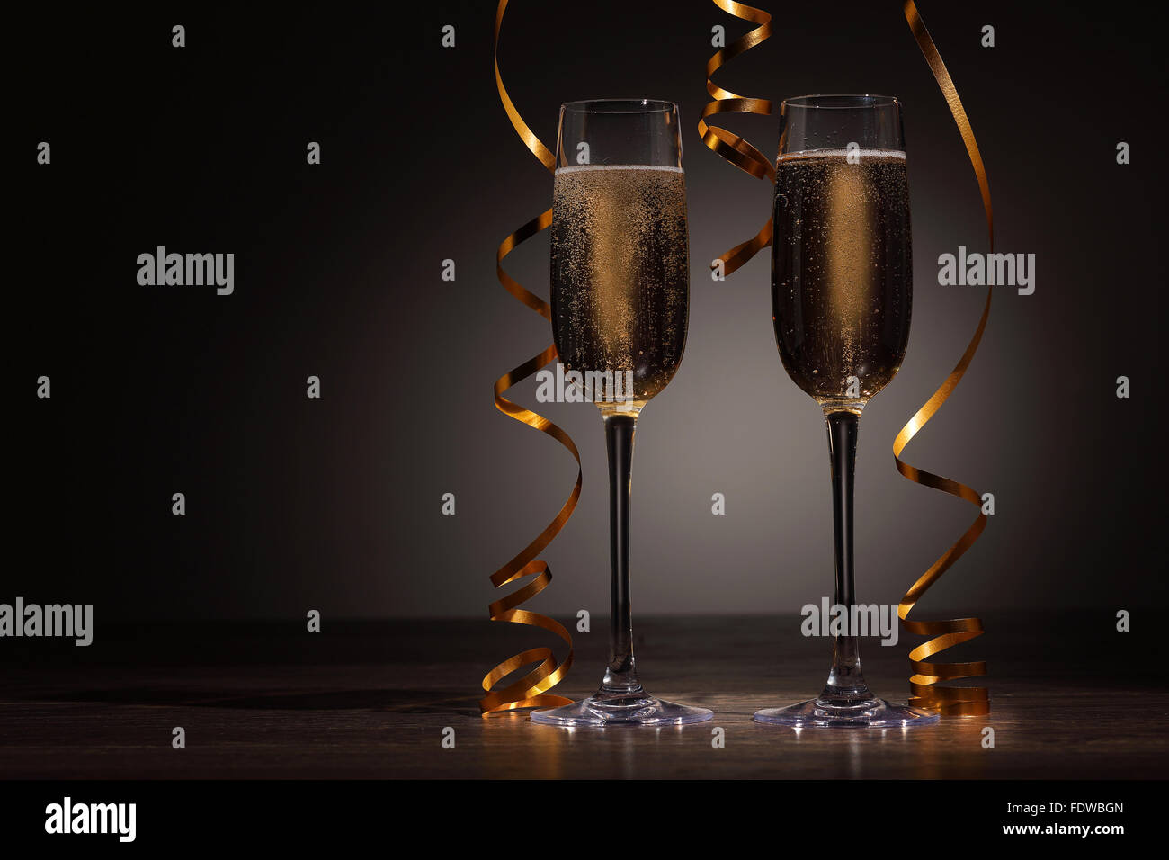 Two champagne glasses ready to bring in the New Year Stock Photo - Alamy