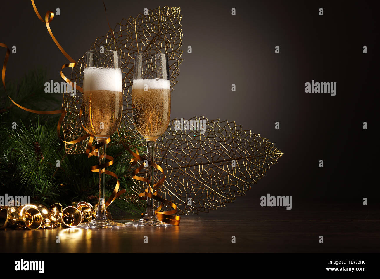 Two champagne glasses ready to bring in the New Year Stock Photo - Alamy