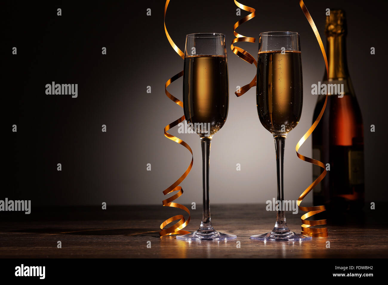 Two champagne glasses ready to bring in the New Year Stock Photo - Alamy