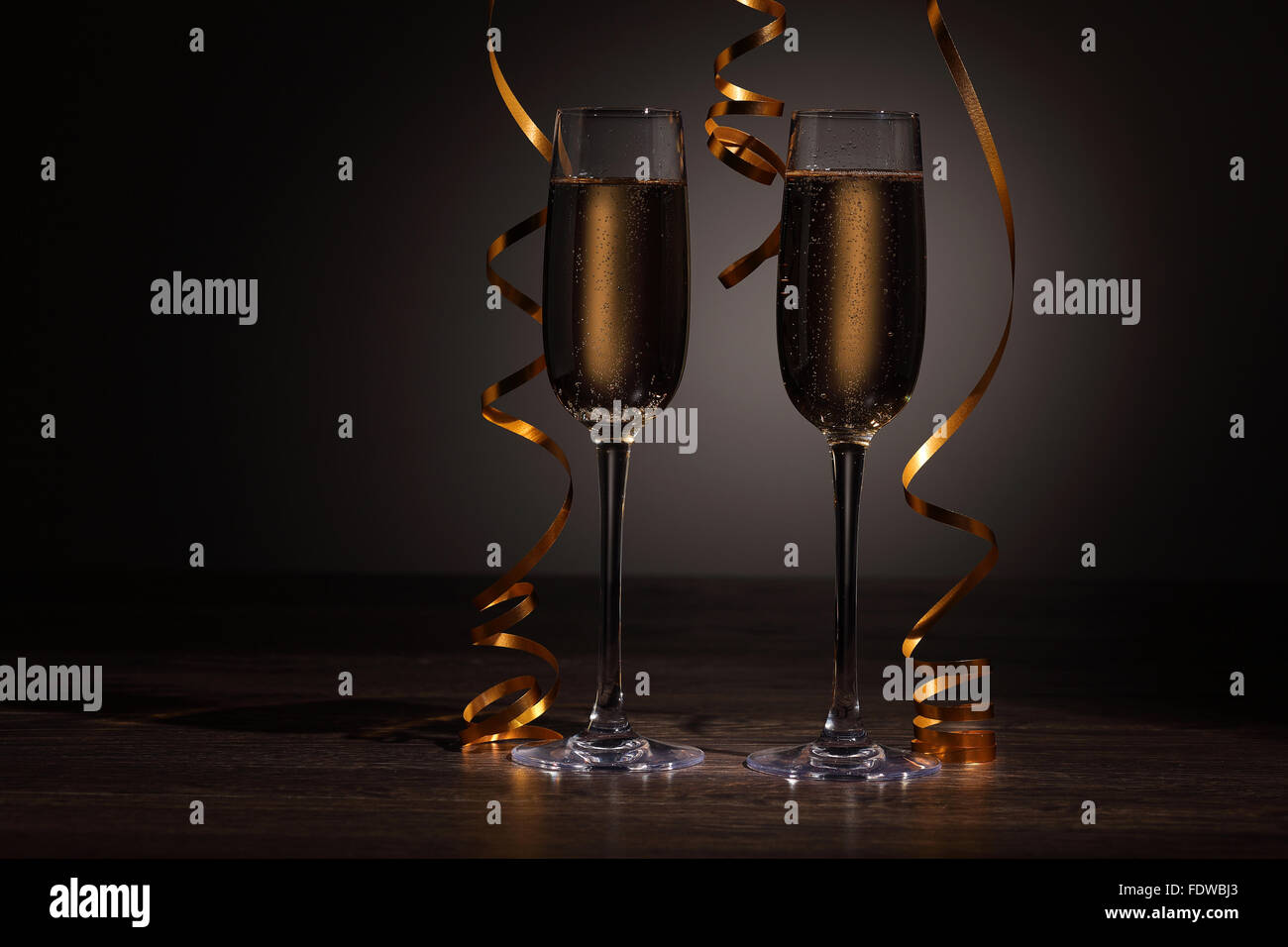 Two champagne glasses ready to bring in the New Year Stock Photo - Alamy