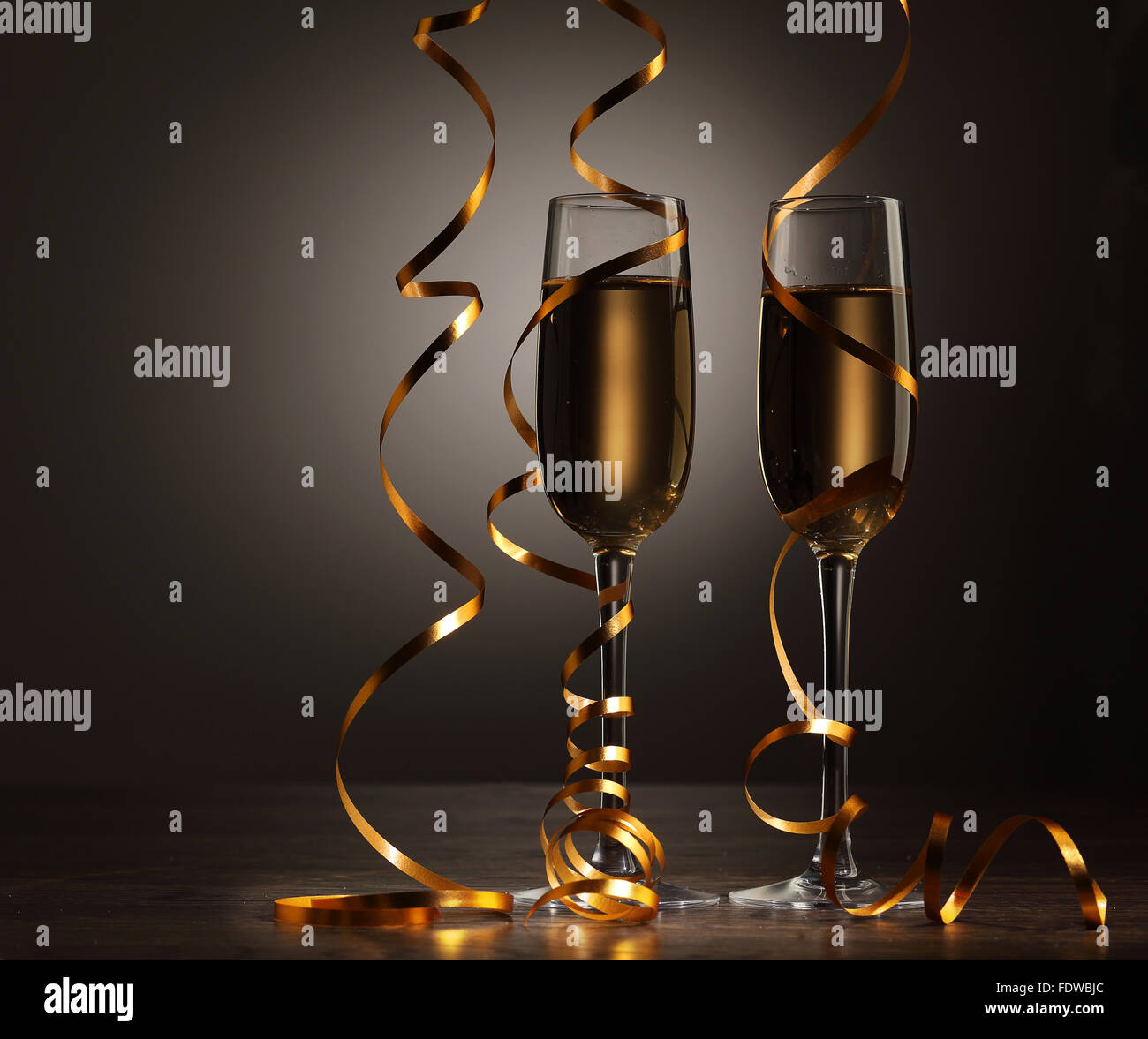 Two champagne glasses ready to bring in the New Year Stock Photo - Alamy