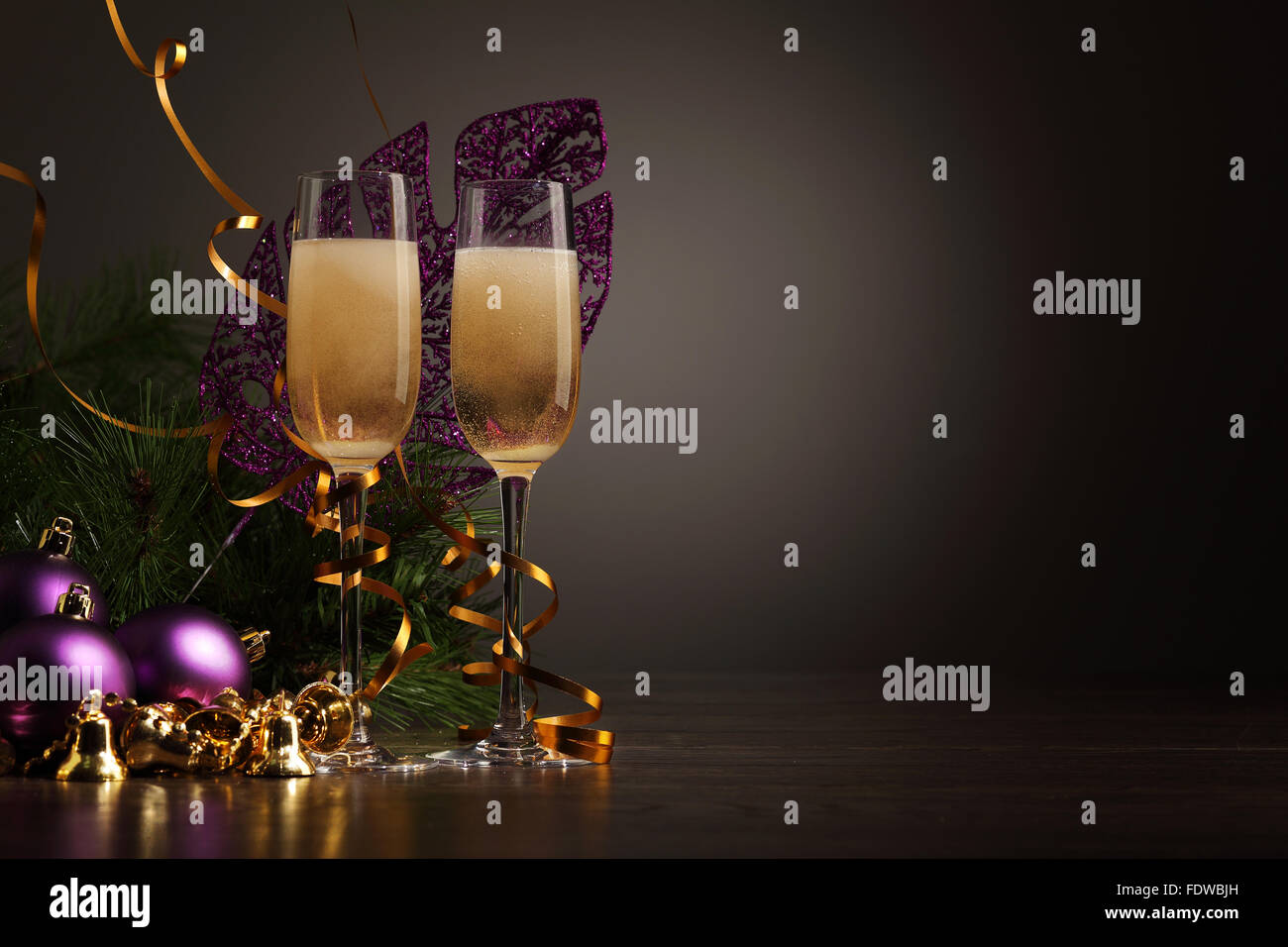 Two champagne glasses ready to bring in the New Year Stock Photo - Alamy