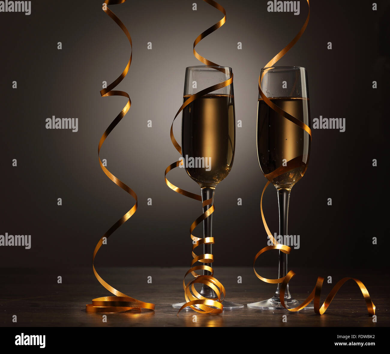 Two champagne glasses ready to bring in the New Year Stock Photo - Alamy