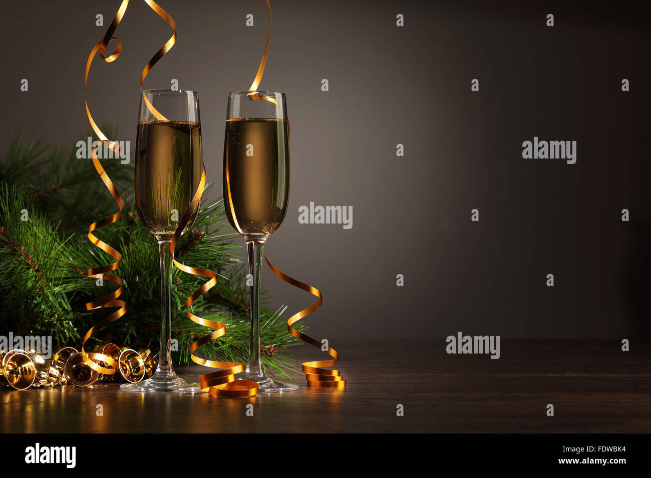 Two champagne glasses ready to bring in the New Year Stock Photo - Alamy