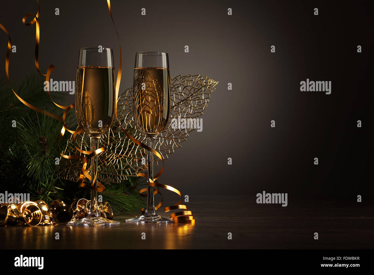 Two champagne glasses ready to bring in the New Year Stock Photo - Alamy