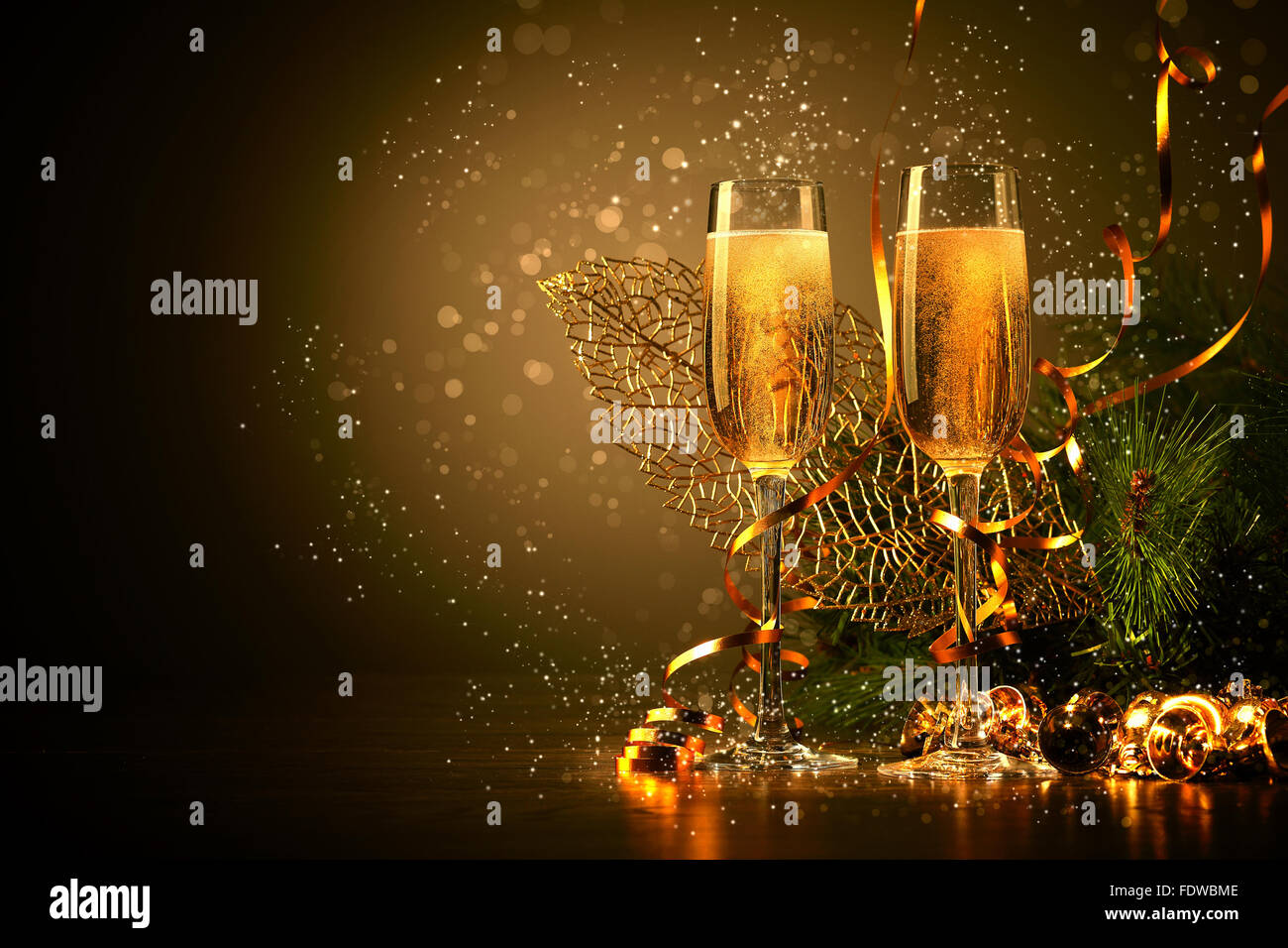 Two champagne glasses ready to bring in the New Year Stock Photo - Alamy