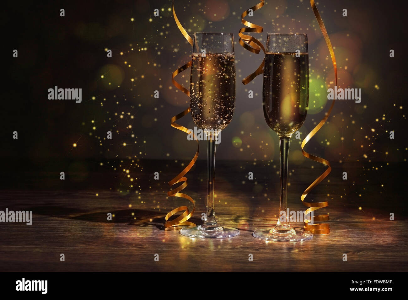 Two champagne glasses ready to bring in the New Year Stock Photo - Alamy