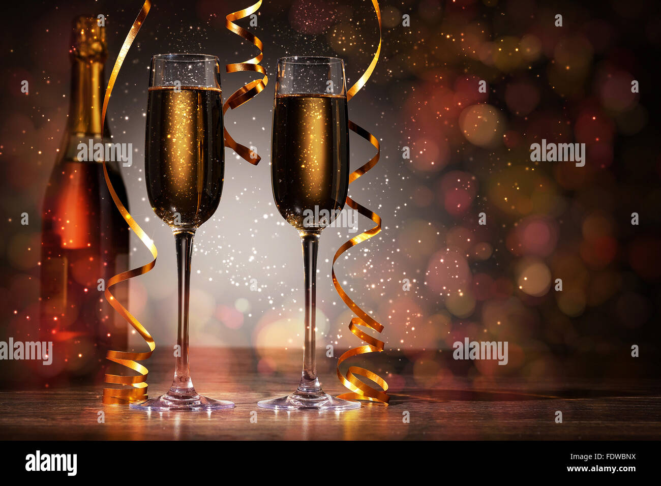 Two champagne glasses ready to bring in the New Year Stock Photo - Alamy