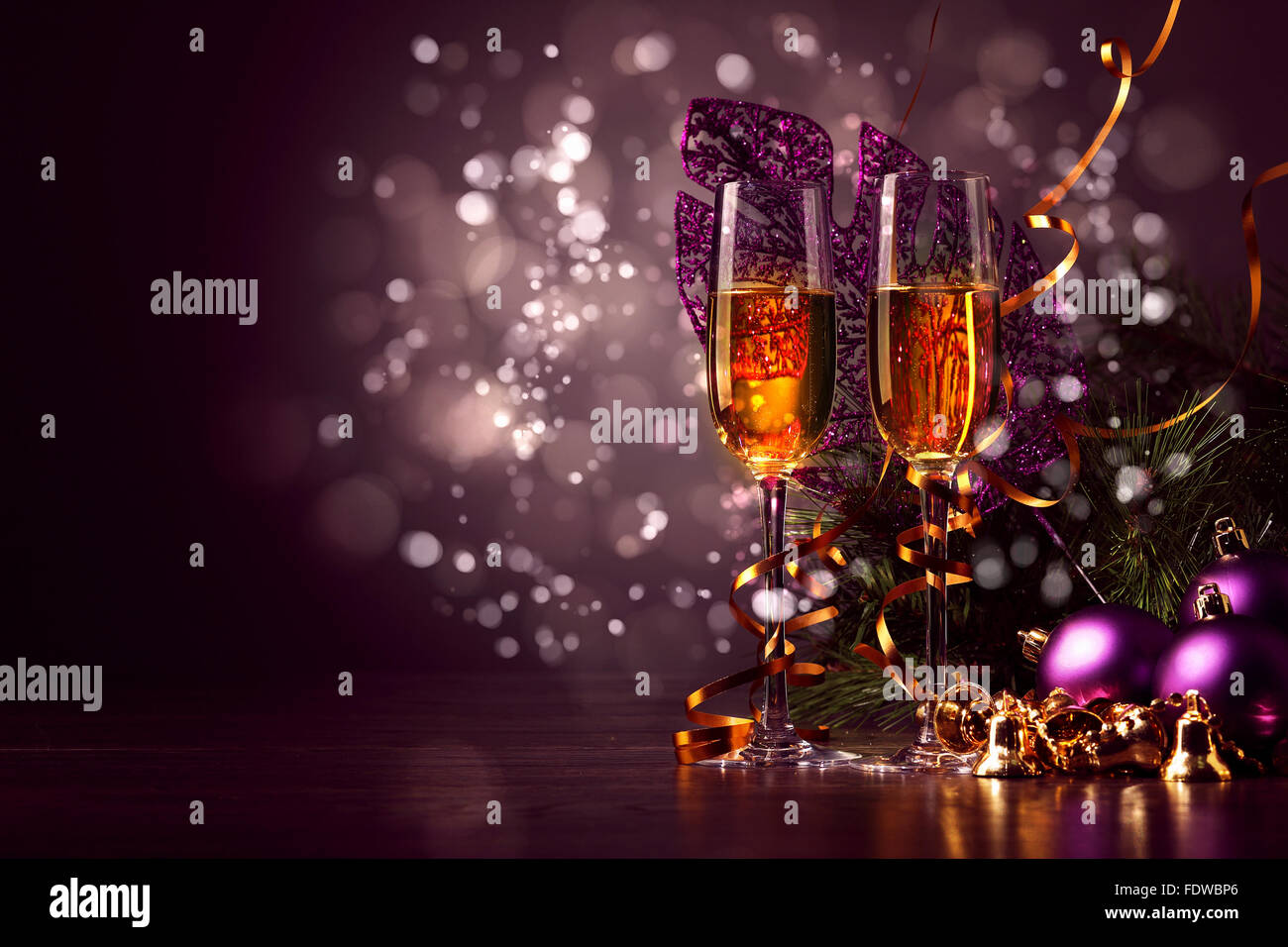 Two champagne glasses ready to bring in the New Year Stock Photo - Alamy