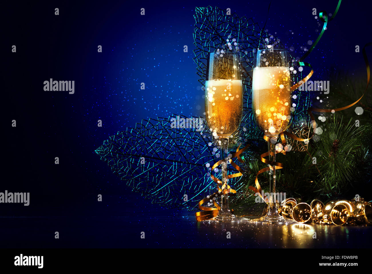 Two champagne glasses ready to bring in the New Year Stock Photo - Alamy