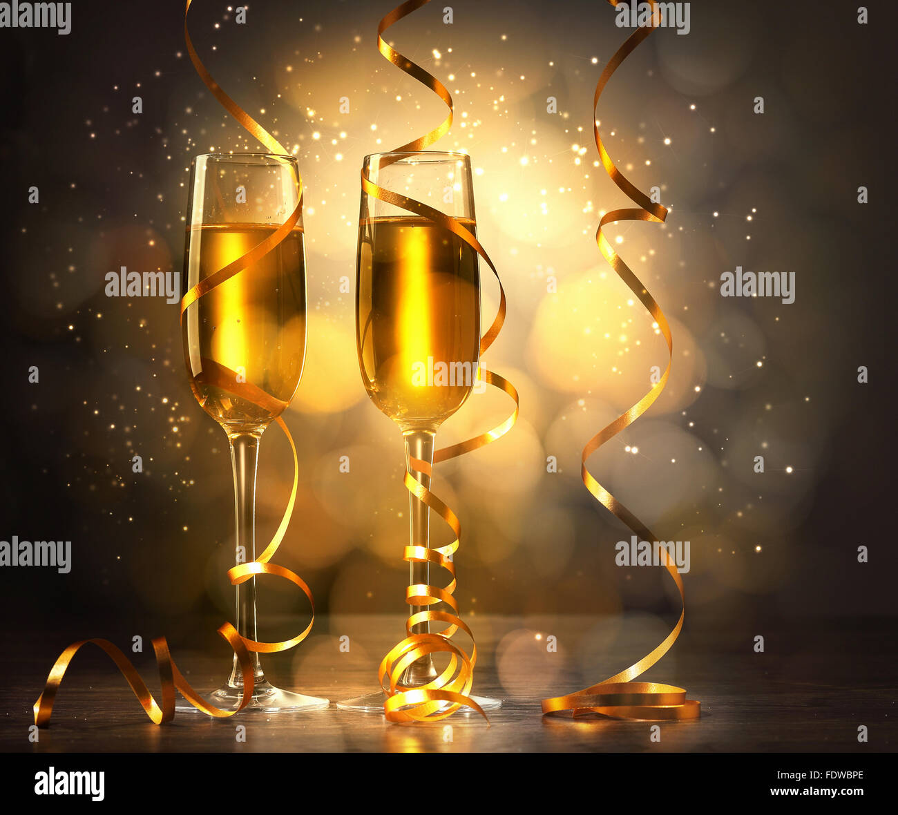 Two champagne glasses ready to bring in the New Year Stock Photo - Alamy