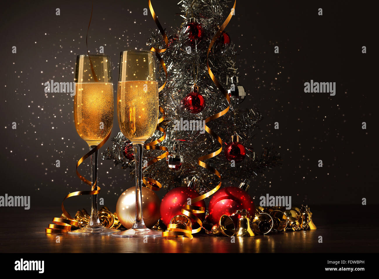 Two champagne glasses ready to bring in the New Year Stock Photo - Alamy