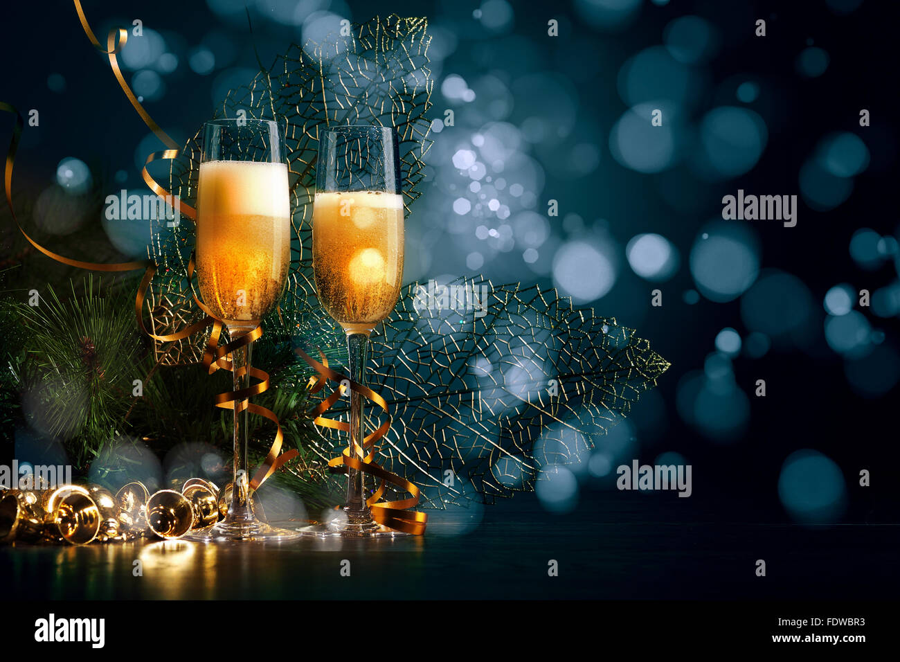 Two champagne glasses ready to bring in the New Year Stock Photo - Alamy