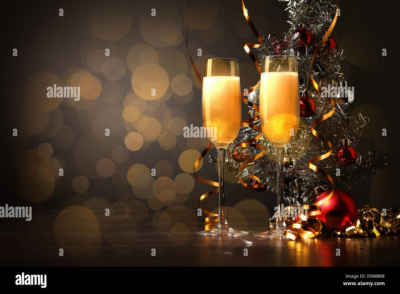 Two champagne glasses ready to bring in the New Year Stock Photo - Alamy