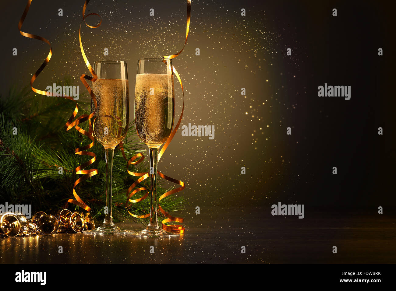 Two champagne glasses ready to bring in the New Year Stock Photo - Alamy