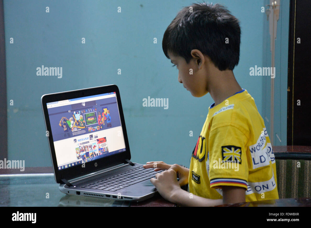 Children playing educational computer games hi-res stock photography ...