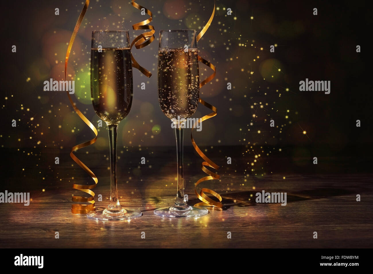 Two champagne glasses ready to bring in the New Year Stock Photo - Alamy