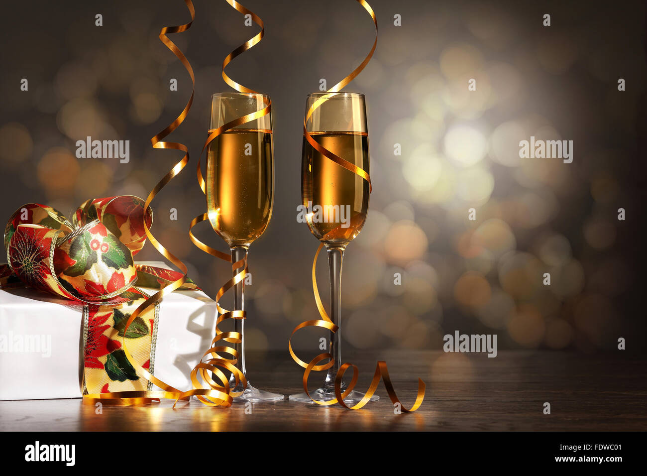 Two champagne glasses ready to bring in the New Year Stock Photo - Alamy