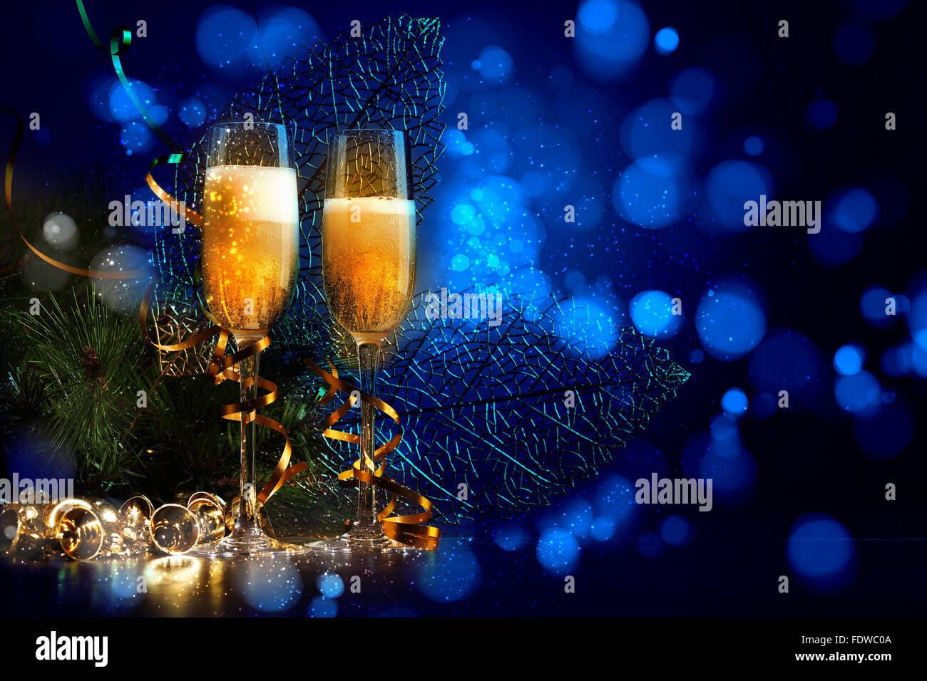 Two champagne glasses ready to bring in the New Year Stock Photo - Alamy