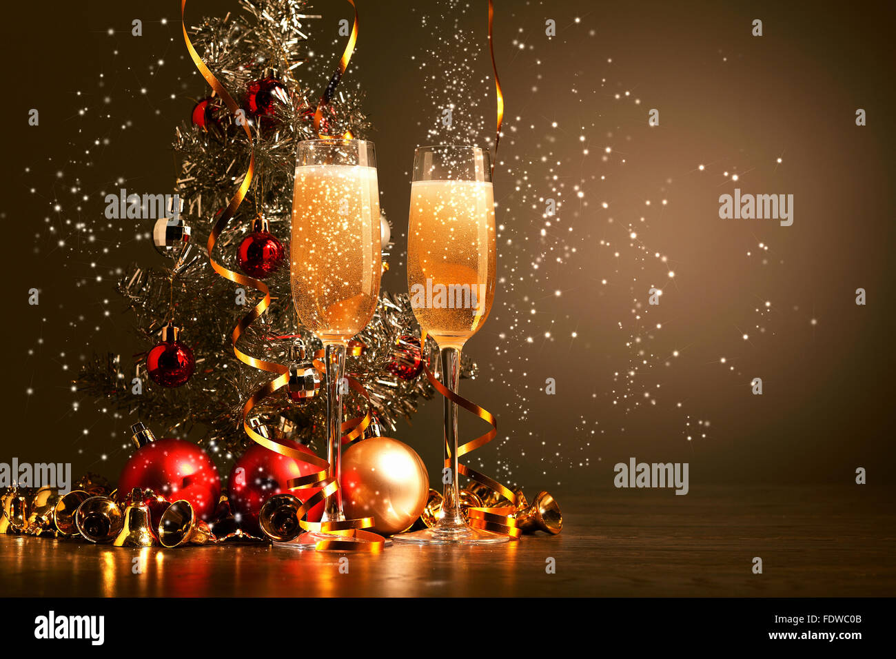 Two champagne glasses ready to bring in the New Year Stock Photo - Alamy