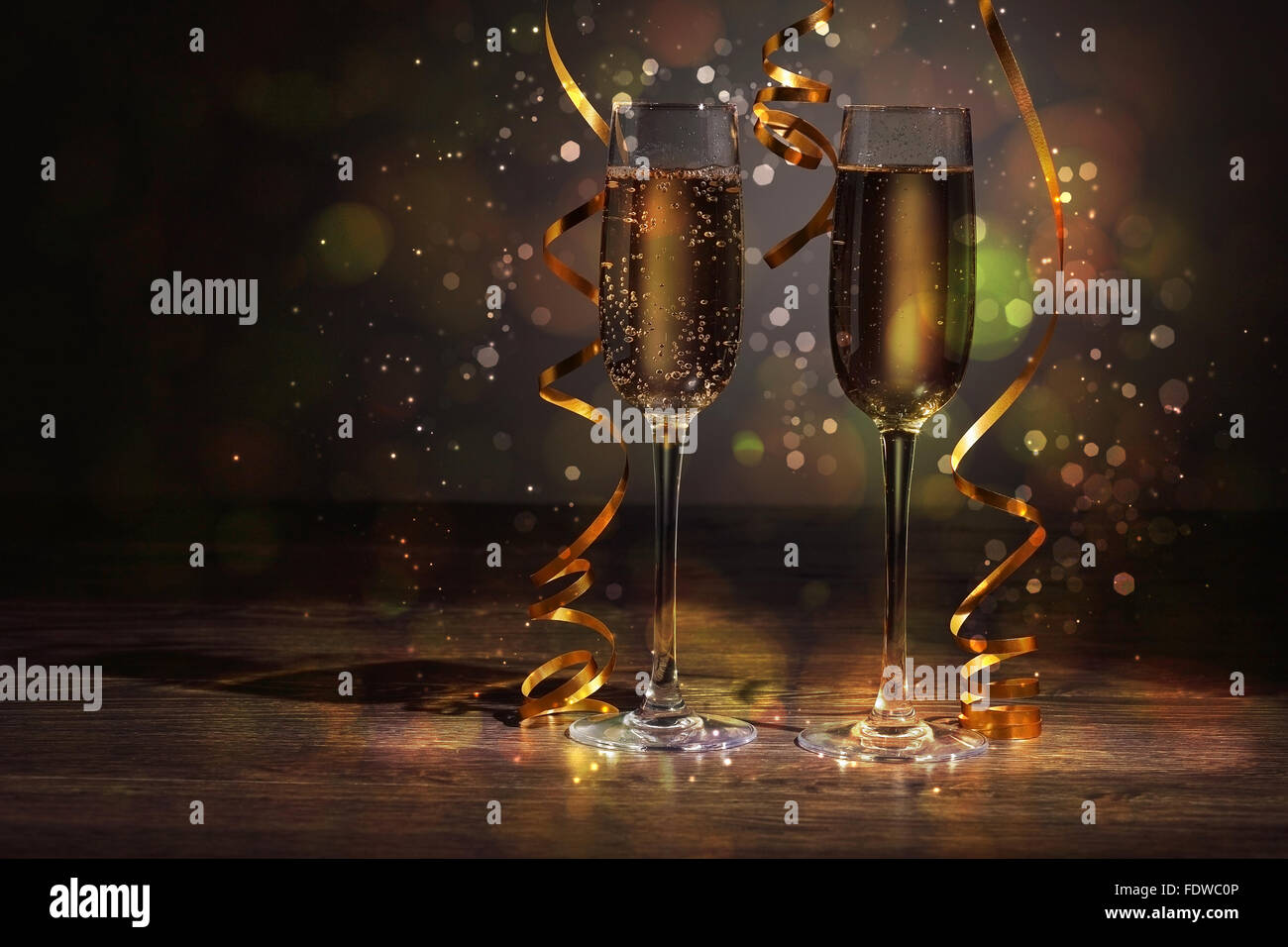Two champagne glasses ready to bring in the New Year Stock Photo - Alamy