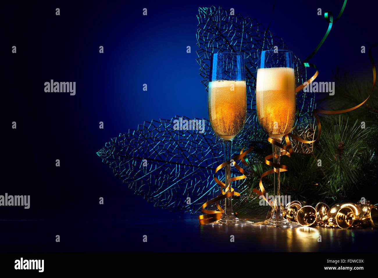 Two champagne glasses ready to bring in the New Year Stock Photo - Alamy
