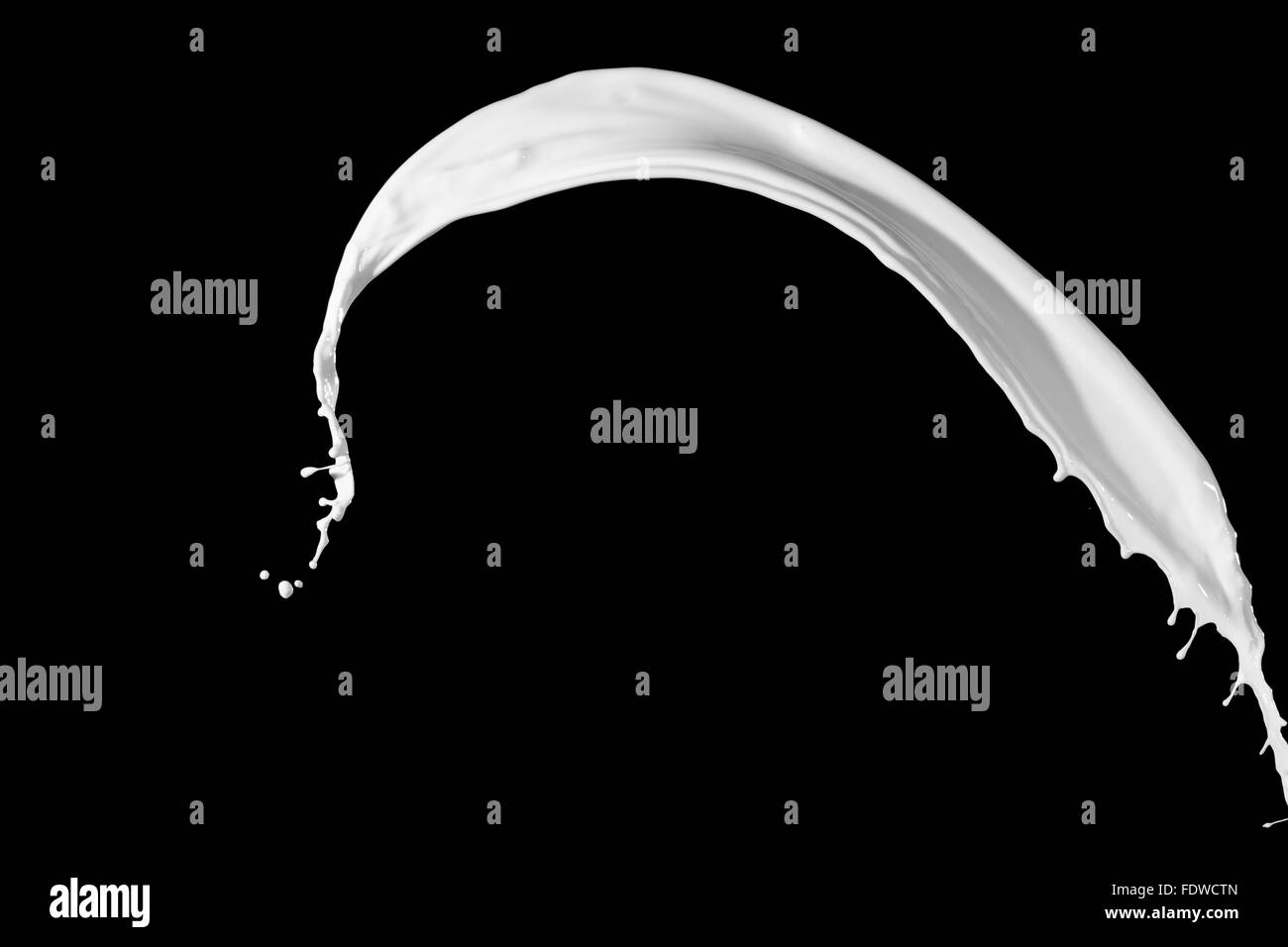 White milk splash isolated on black background Stock Photo Alamy