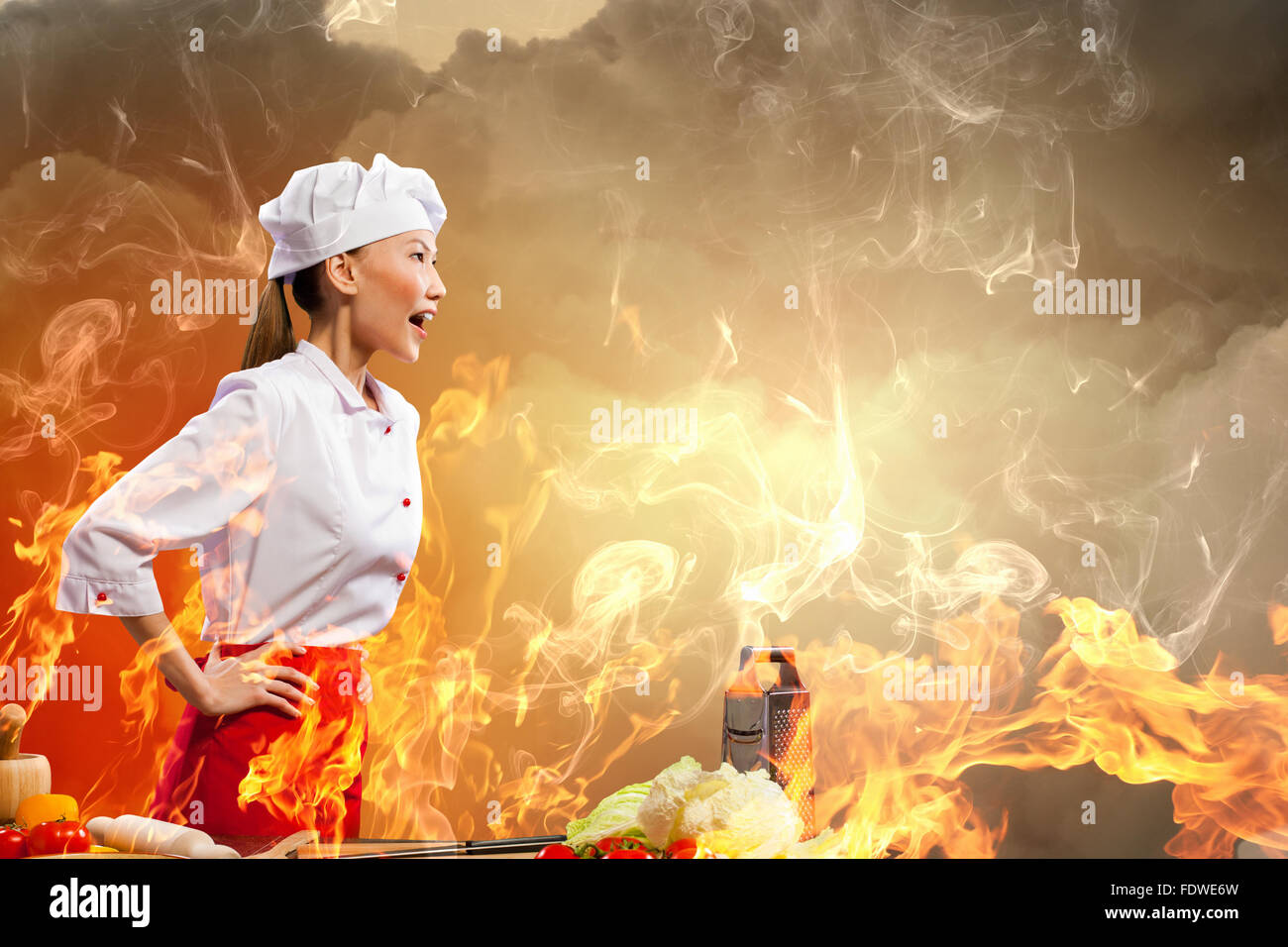 Asian female cook in anger against color background with shine effects ...