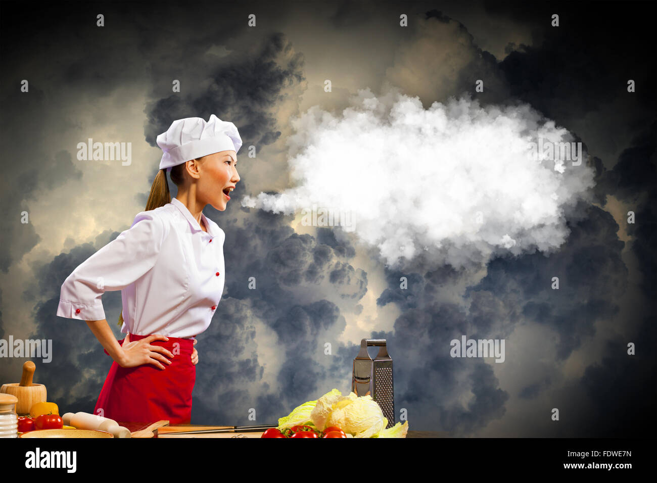 Asian female cook in anger against color background with shine effects ...