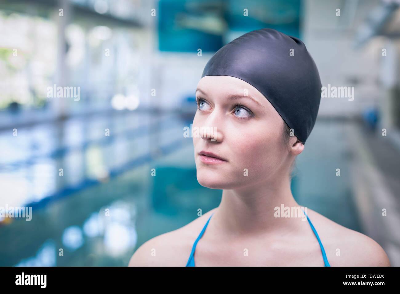 Pretty woman wearing swim cap Stock Photo Alamy