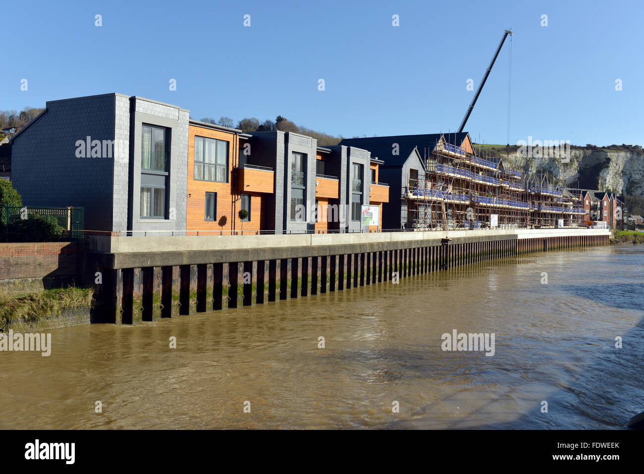 Waterfront houses being built on floodplain in Lewes UK Stock Photo