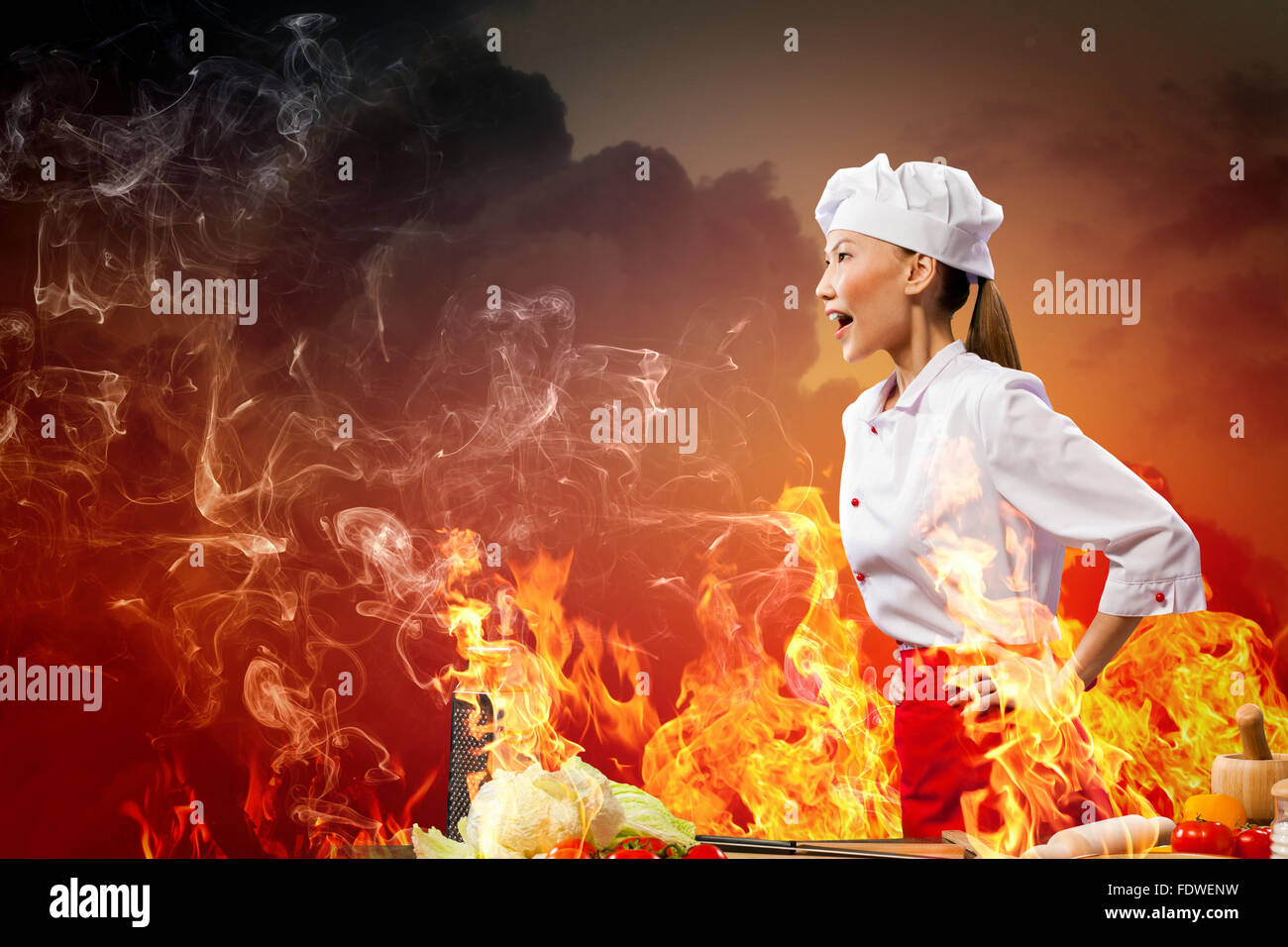 Asian female cook in anger against color background with shine effects ...