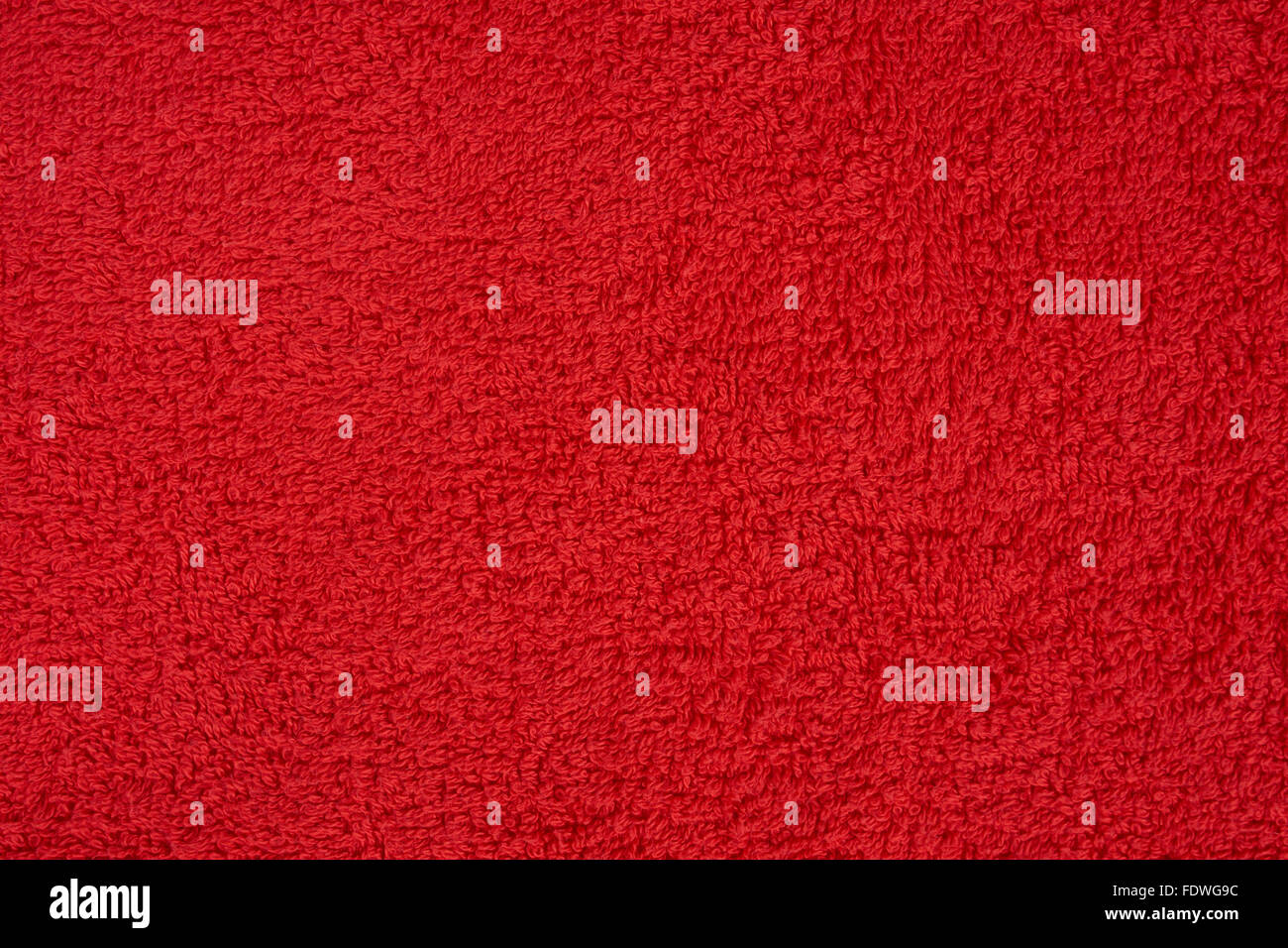 Red terry towel as a seamless background Stock Photo