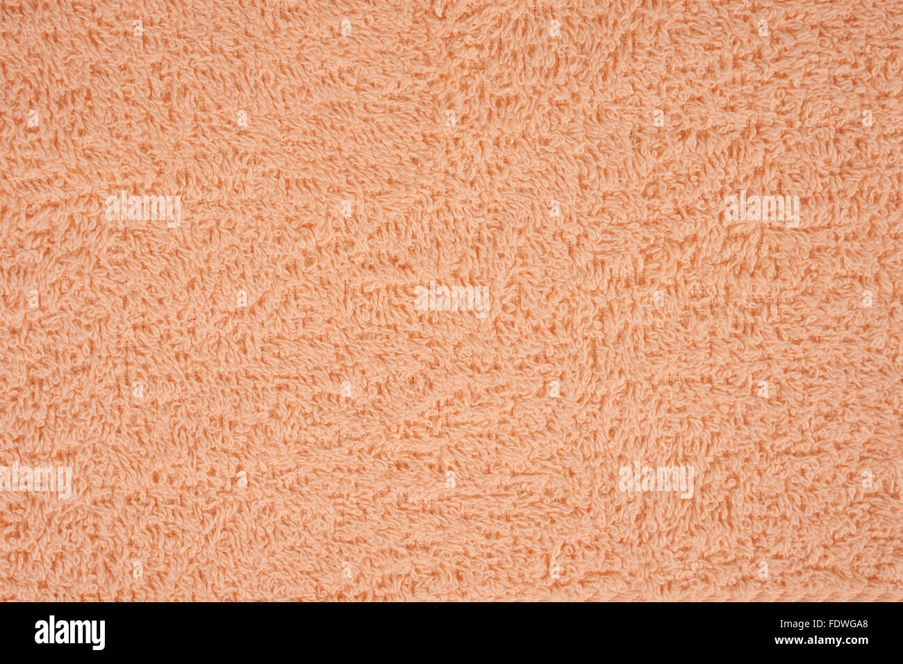 Beige terry towel as a seamless background Stock Photo
