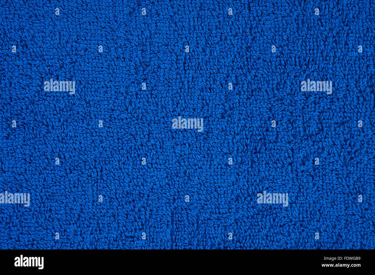 Dark blue terry towel as a seamless background Stock Photo
