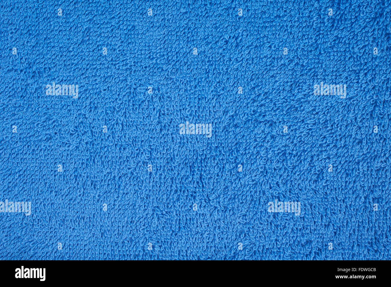 Blue terry towel as a seamless background Stock Photo