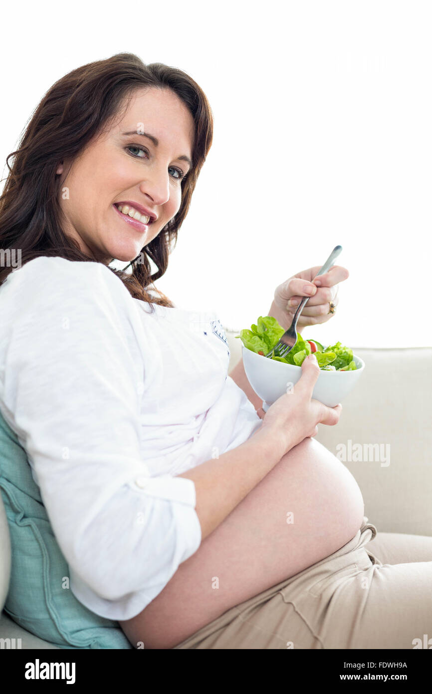 Pregnant woman eating salad Stock Photo Alamy