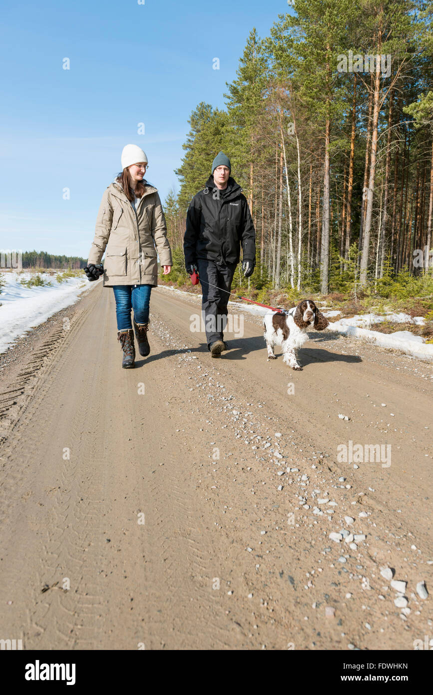 Females walking dog hi-res stock photography and images - Alamy