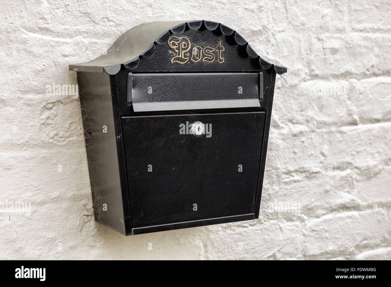 Black Mailbox With Gold Lettering On A White Brick Wall Model Release No Property Release No Stock Photo Alamy