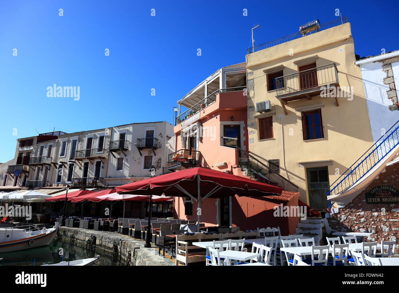 Crete, port Rethymno, at the Venetian harbour, street restaurants along the promenade Stock Photo